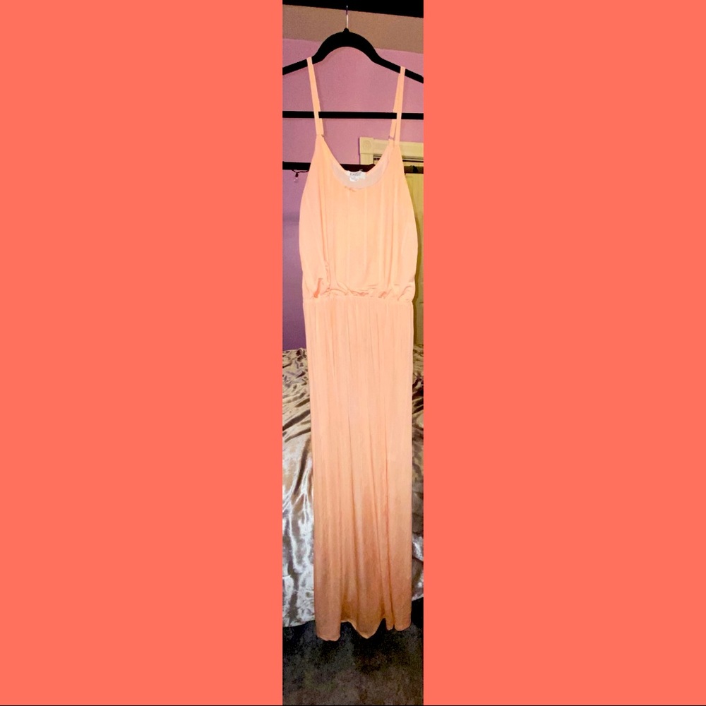 This is a Flowey, Coral colored summer sundress !